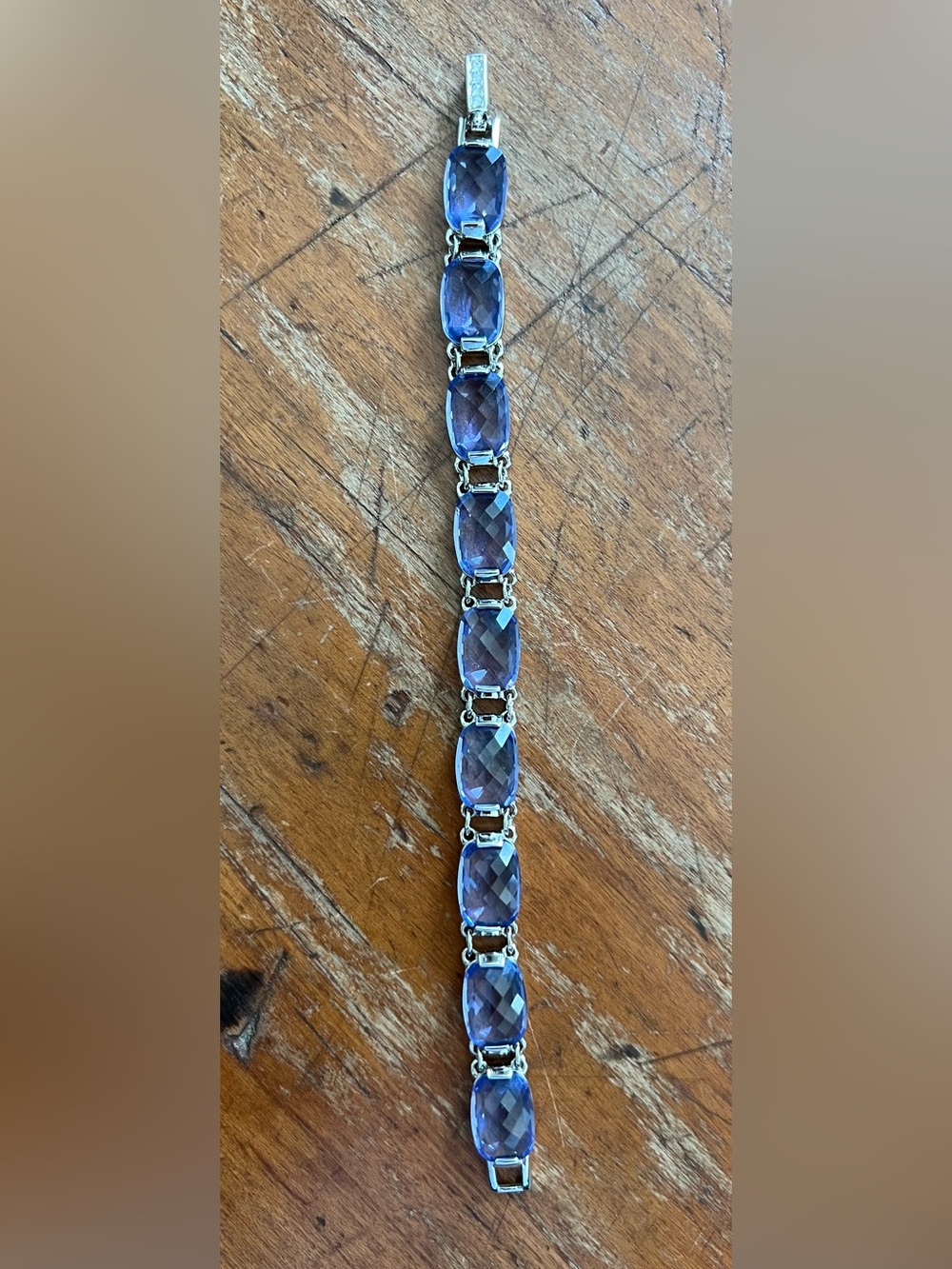 Vintage Swarovski silver tennis bracelet w/oval-cut purple/tanzanite crystals-7โ